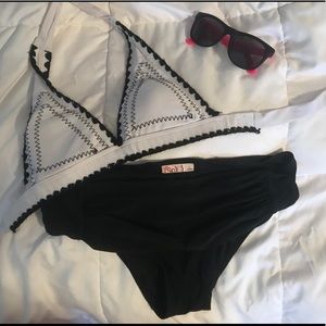 Swim bottoms with ruched flap